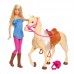 Barbie-nukke ja hevonen