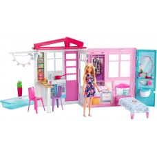 Barbie-nukkekoti nukeineen ja huonekaluineen
